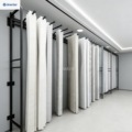 Custom-made display racks for floor-to-ceiling curtains in retail stores, fabric sample display racks, and fabric storage racks